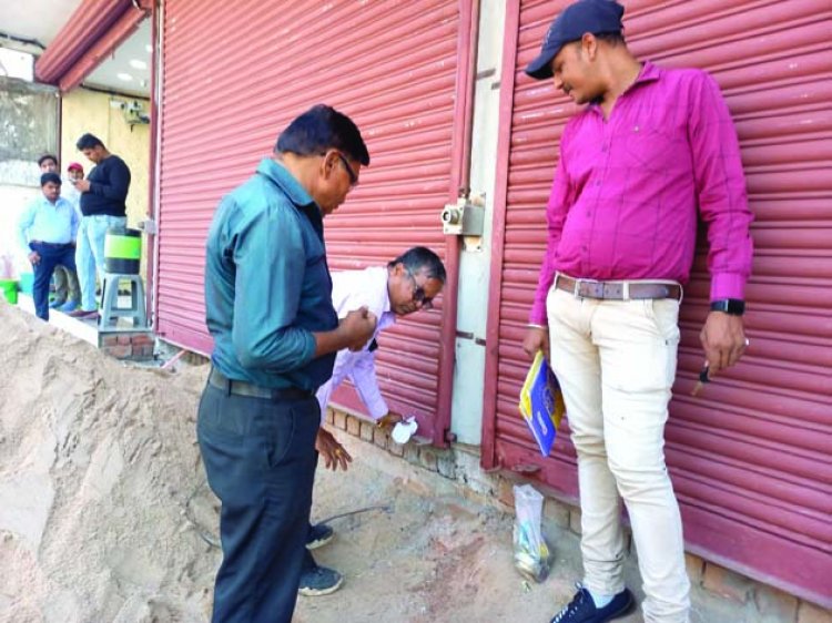 अनाधिकृत विकास व निर्माण का नियमितीकरण नहीं कराने वाले दुकान एवं भवनों को किया गया सील